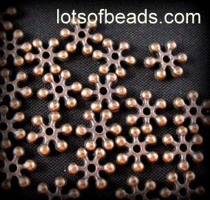 Copper snowflake daisy spacer